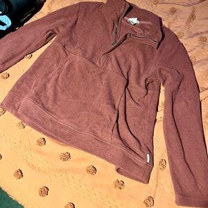 Woman’s burgundy avalanche sweater